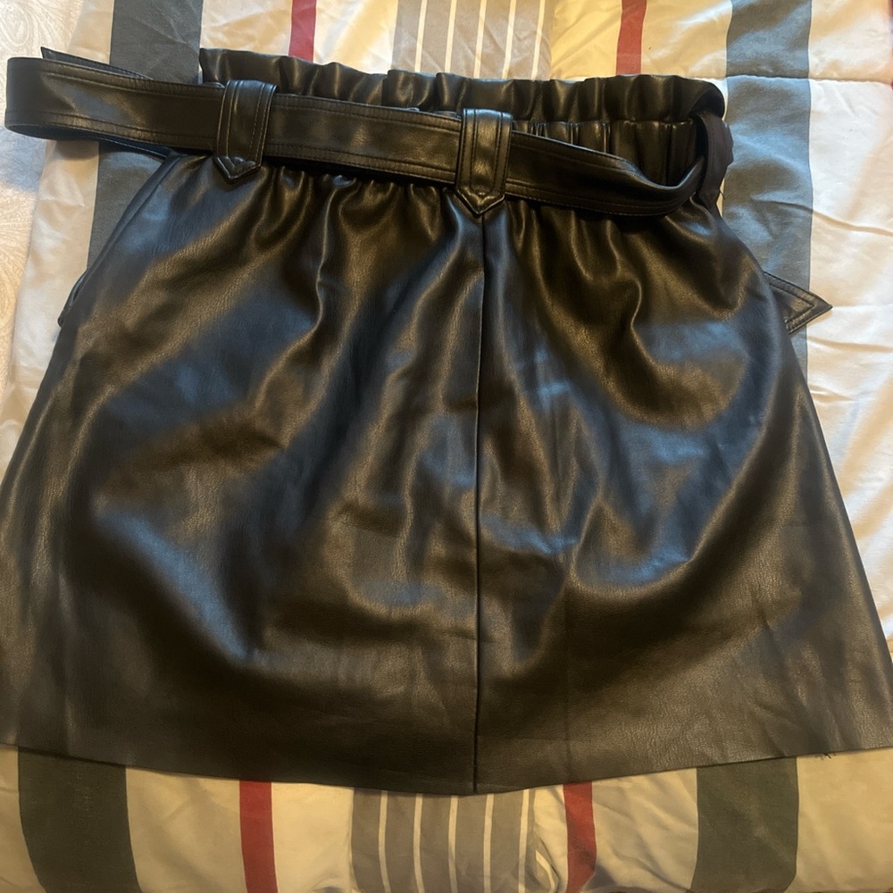 A black faux leather skirt #skirt #woman #Fauxleather